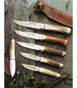 Muela Fist knife made of deer and brass